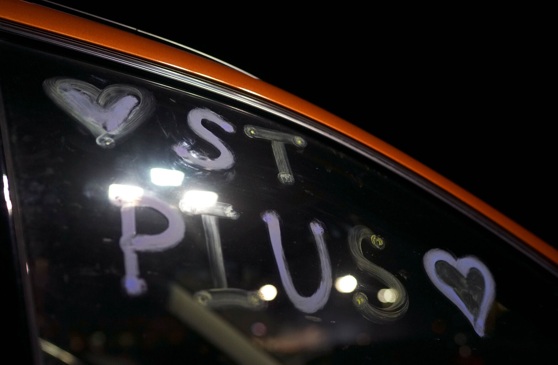 A car decorated in support of St. Pius X High School